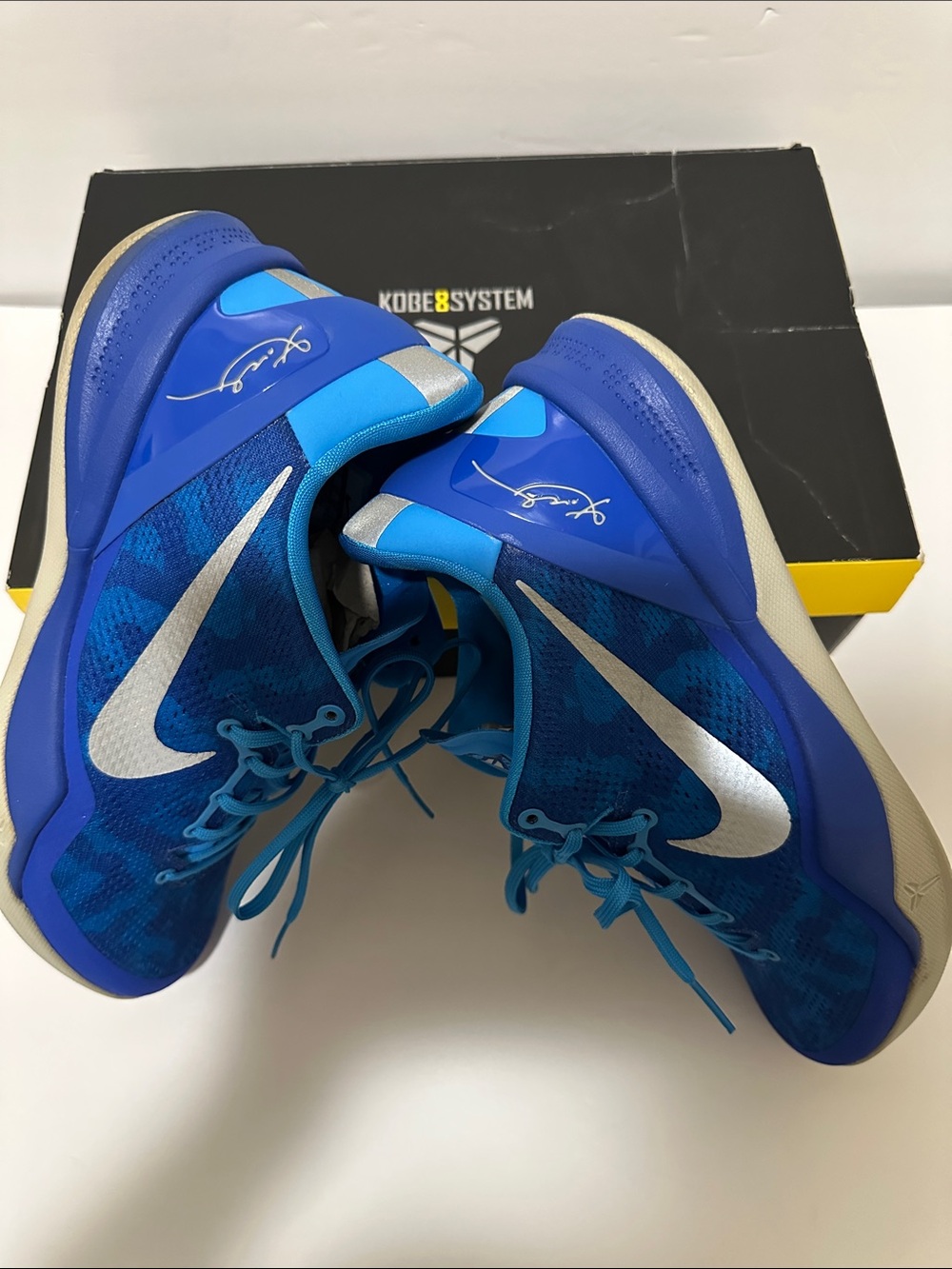 Nike Kids Blue Basketball Sneakers with Silver Swoosh
